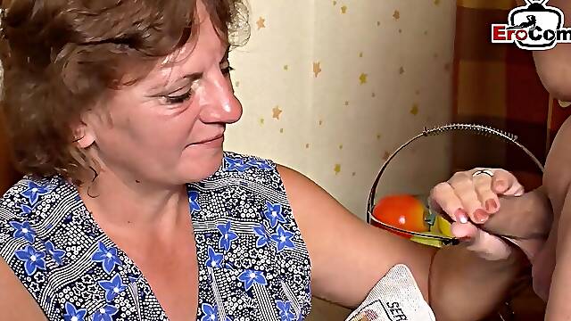 German Maid Joins MILF and Older Couple for Threesome