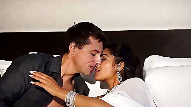 Exotic woman, Maya is making love with a foreigner in his hotel room and enjoying it