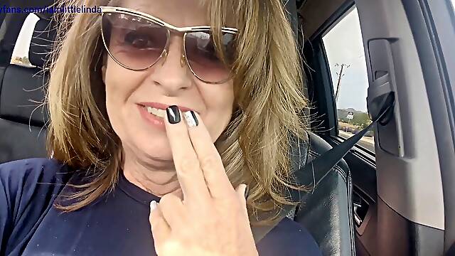 Hot cougar mom has a solo session with a dildo in the dressing room and squirts